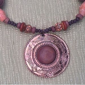 Beautiful and rustic beaded medallion